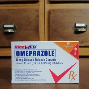 White plastic prescription bottle of Omeprazole 40mg delayed-release capsules, 90 count bulk supply for chronic acid reflux management.